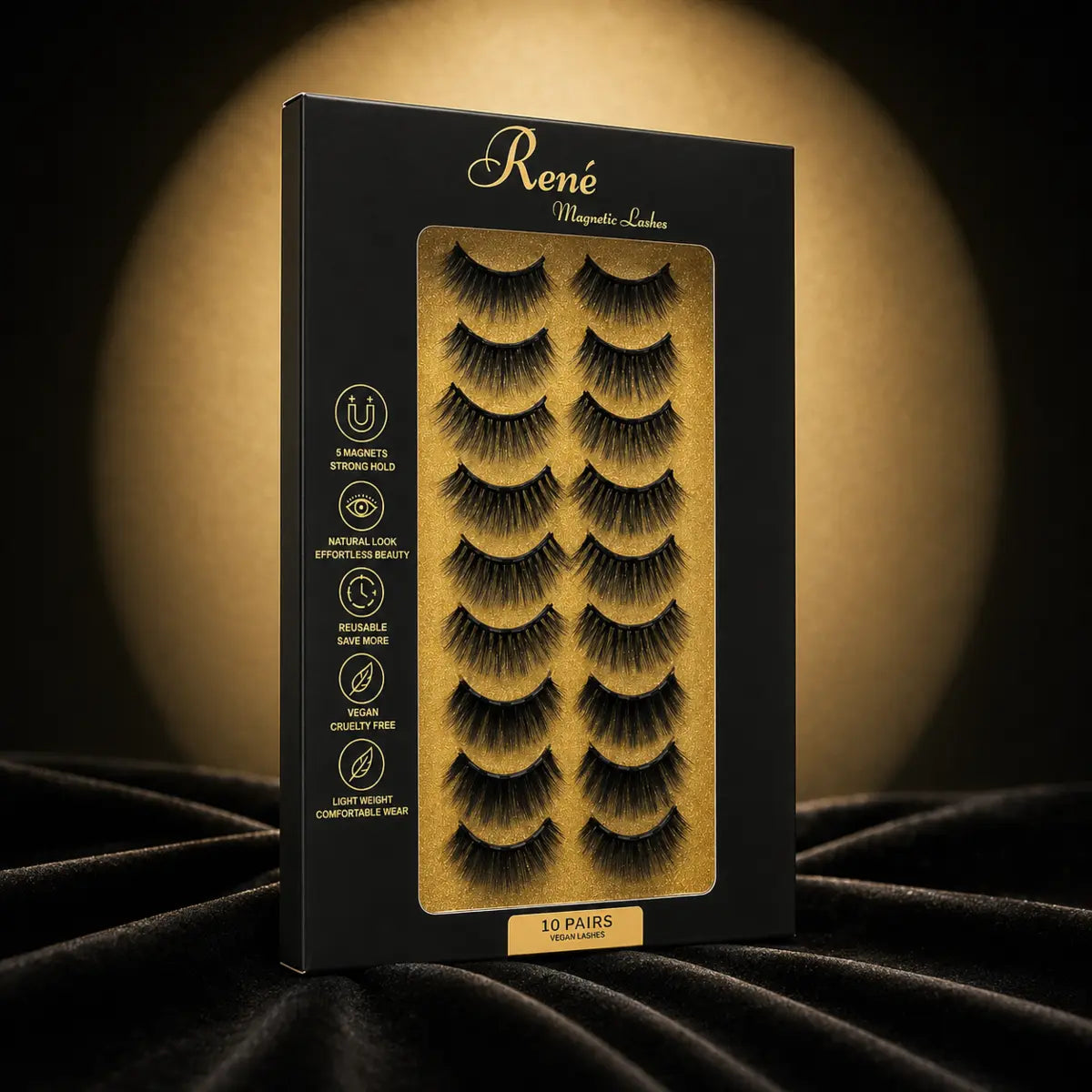René ten-pair medium magnetic lash set on black satin with gold lighting
